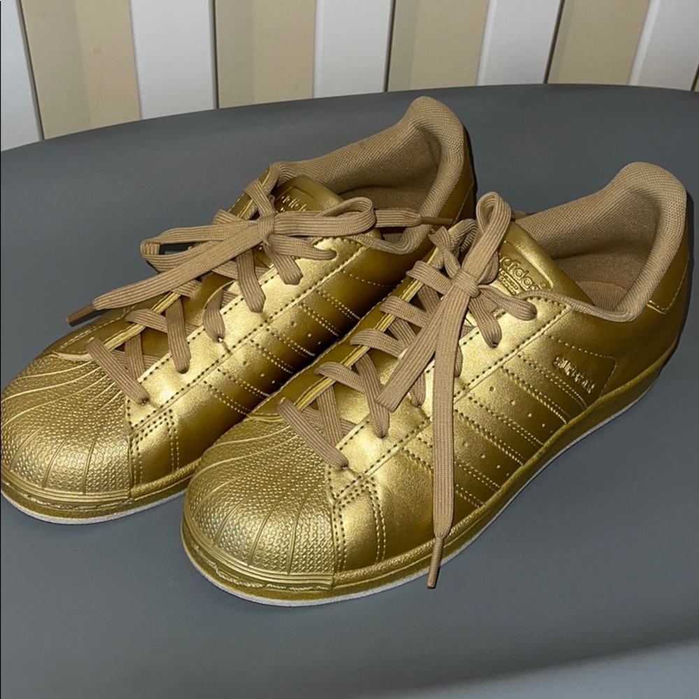 Adidas superstar gold sneakers